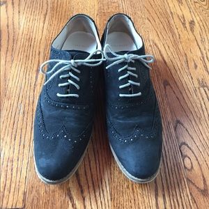 Black suede Cole Haan shoes.